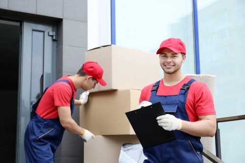 Furniture pick-up team handling bulky household items in Beckenham