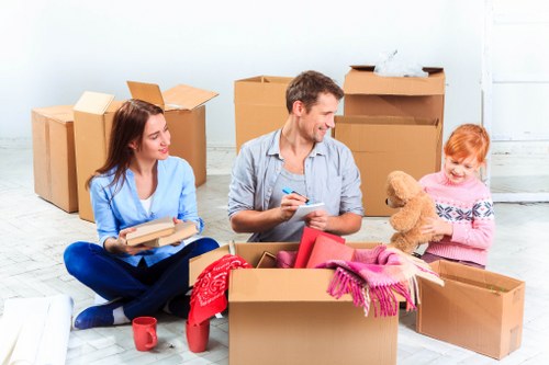 Removal team planning a move in Beckenham street with local houses