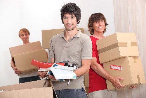 Office furniture and boxes prepared for a business move in Beckenham