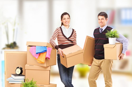 Packed household boxes and furniture for transport